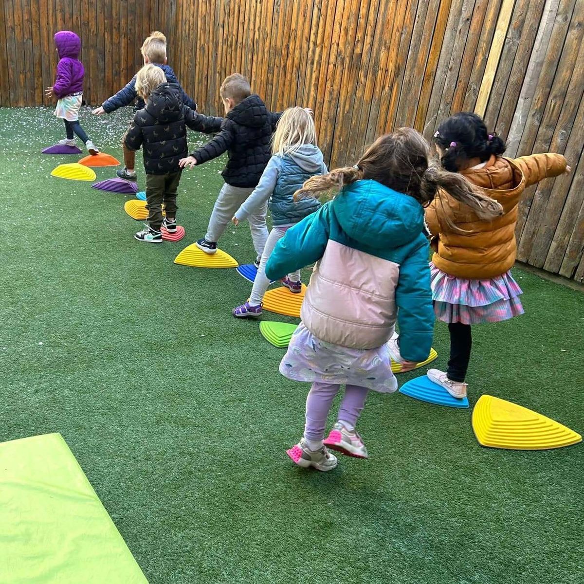 Diverse children learning together at World of Wonder