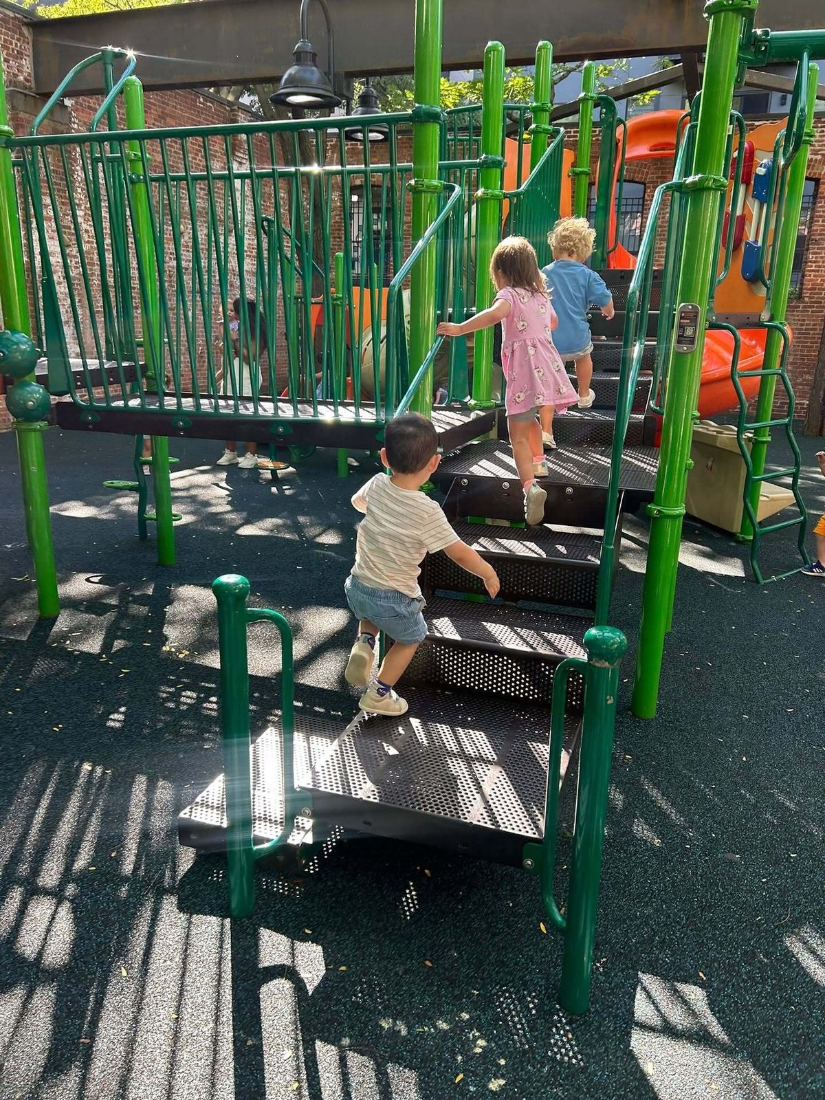 Children enjoying outdoor play at World of Wonder playground