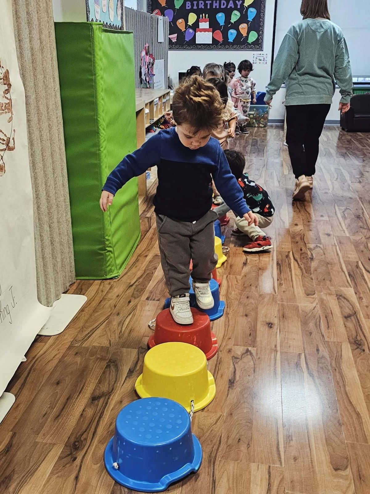 Toddler exploring at World of Wonder daycare